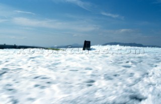 Maxi Yacht Rolex Cup 2001. Porto Cervo, Sardinia. American submarine (possibly a Los Angeles class fast attack sub) submerging.