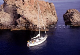 Group of people anchored in the mediterranean sea.