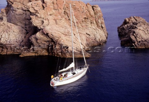 Group of people anchored in the mediterranean sea