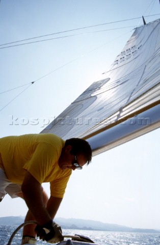 Man on a boat using a winch