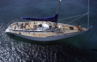 Group of people relaxing on a Nautor Swan sailboat