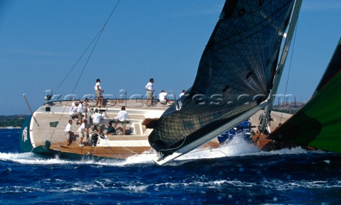 The helmsman onboard the original Wally yacht GenieoftheLamp fights to maintain control of the 77 fo