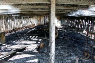 GREENWICH, ENGLAND - MAY 23rd:  First pictures of the fire damage below deck onboard the Cutty Sark, the worlds last remaining Tea Clipper ship, after it was destroyed by fire on May 21st 2007. Police forensic teams continue to investigate the cause. The Cutty Sark Restoration Trust will raise money to rebuild the ship.