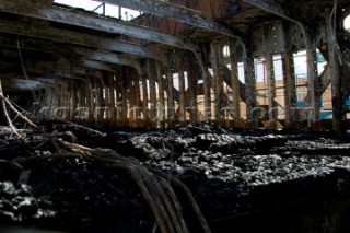 GREENWICH, ENGLAND - MAY 23rd:  First pictures of the fire damage below deck onboard the Cutty Sark, the worlds last remaining Tea Clipper ship, after it was destroyed by fire on May 21st 2007. Police forensic teams continue to investigate the cause. The Cutty Sark Restoration Trust will raise money to rebuild the ship.