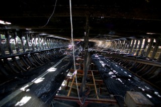 GREENWICH, ENGLAND - MAY 23rd:  First pictures of the fire damage below deck onboard the Cutty Sark, the worlds last remaining Tea Clipper ship, after it was destroyed by fire on May 21st 2007. Police forensic teams continue to investigate the cause. The Cutty Sark Restoration Trust will raise money to rebuild the ship.