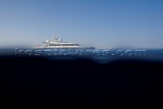 Superyacht moving across a calm sea