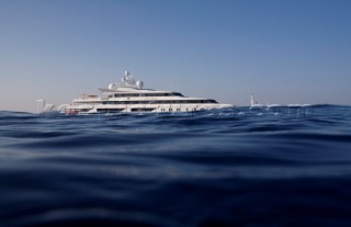 Superyacht moving across a calm sea