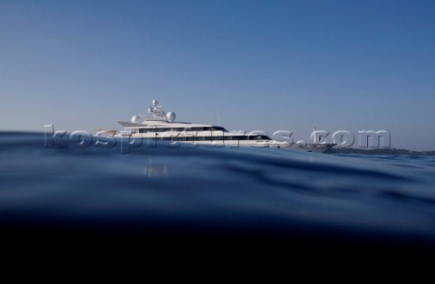 Superyacht moving across a calm sea