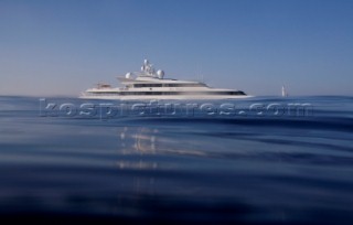 Superyacht moving across a calm sea