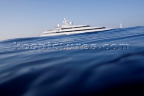 Superyacht moving across a calm sea