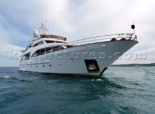 Benetti superyacht anchored in windy conditions in the Mediterranean