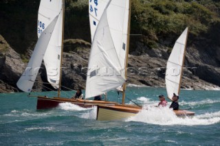 Salcombe Yawls planning and surfing downwind during racing at the Salcombe Regatta Week 2011, Devon, UK