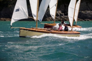 Salcombe Yawls planning and surfing downwind during racing at the Salcombe Regatta Week 2011, Devon, UK