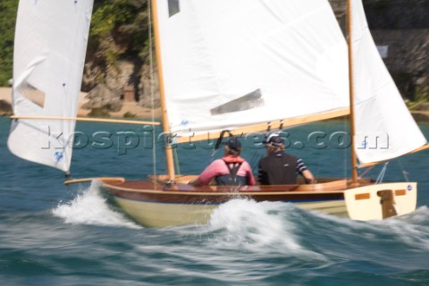 Salcombe Yawls planning and surfing downwind during racing at the Salcombe Regatta Week 2011 Devon U