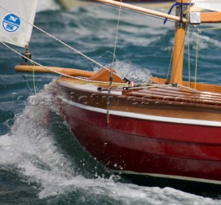 Salcombe Yawls planning and surfing downwind during racing at the Salcombe Regatta Week 2011, Devon, UK