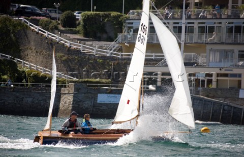 Salcombe Yawls planning and surfing downwind during racing at the Salcombe Regatta Week 2011 Devon U