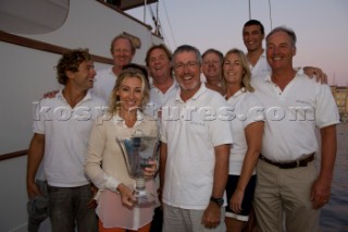 Voiles de Saint-Tropez 2011 - The Blue Bird Cup speed under sail challenge between Tara Getty (Skylark) and Griff Rhys Jones (Argyle). Argyle wins. The trophy is presented by Jessica Getty.