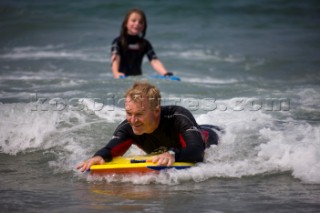 Body Boarding in the surf on the beach in St Ives in Cornwall, UK.