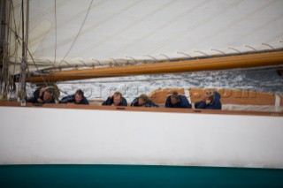 SAINT-TROPEZ, FRANCE - The wet and tired crew on the deck of the classic gaff rigged yacht Mariquita built in 1911, during racing in the Voiles de St Tropez on October 3rd 2006. The largest classic and modern yachts from around the world gather in Saint-Tropez annually for a week of racing and festivities to mark the end of the Mediterranean season, before heading across the Atlantic to winter in the Caribbean.