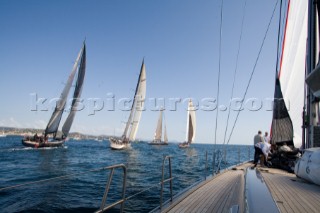 SAINT-TROPEZ, FRANCE - October 5th: The crew onboard the Wally maxi yacht Dangerous But Fun of Monaco owned by Michelle Perris prepare to hoist the jib and drop the asymmetric spinnaker during racing on October 5th 2006. The largest classic and modern yachts from around the world gather in Saint-Tropez annually for a week of racing and festivities to mark the end of the Mediterranean season, before heading across the Atlantic to winter in the Caribbean.