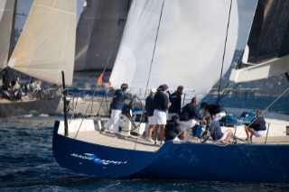 SAINT-TROPEZ, FRANCE - The Wally maxi yacht Magic Carpet 3 owned and being driven by Sir Lyndsey Owen Jones, CEO of LOreal cosmetics, racing in the Voiles de Saint Tropez on October 5th 2006. The largest classic and modern yachts from around the world gather in Saint-Tropez annually for a week of racing and festivities to mark the end of the Mediterranean season, before heading across the Atlantic to winter in the Caribbean.