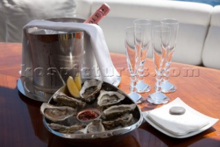 Champagne and oysters onboard a superyacht