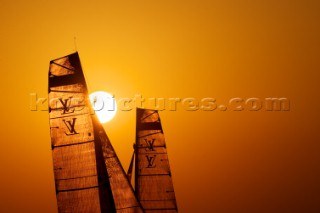 LOUIS VUITTON TROPHY, DUBAI, UNITED ARAB EMIRATES, NOVEMBER 20TH 2010:  Sails of the IACC yachts at sunset. Louis Vuitton Trophy in Dubai (12 - 27 November 2010).