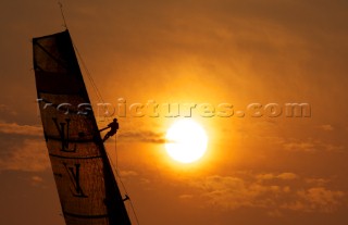 LOUIS VUITTON TROPHY, DUBAI, UNITED ARAB EMIRATES, NOVEMBER 20TH 2010:  Sails of the IACC yachts at sunset.  Louis Vuitton Trophy in Dubai (12 - 27 November 2010).