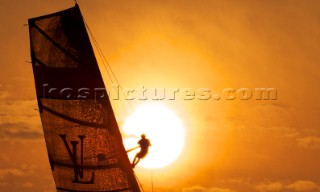 LOUIS VUITTON TROPHY, DUBAI, UNITED ARAB EMIRATES, NOVEMBER 20TH 2010:  Sails of the IACC yachts at sunset.  Louis Vuitton Trophy in Dubai (12 - 27 November 2010).