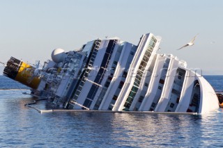 The passenger cruise ship Costa Concordia hit rocks and ran aground at 9.45pm on the Island of Giglio on January 13th 2012. The wrecked ship lays on a reef heeled on its side.