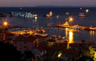 The passenger cruise ship Costa Concordia hit rocks and ran aground at 9.45pm on the Island of Giglio on January 13th 2012. The wrecked ship lays on a reef heeled on its side.