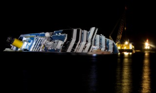 The passenger cruise ship Costa Concordia hit rocks and ran aground at 9.45pm on the Island of Giglio on January 13th 2012. The wrecked ship lays on a reef heeled on its side.