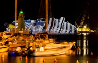 The passenger cruise ship Costa Concordia hit rocks and ran aground at 9.45pm on the Island of Giglio on January 13th 2012. The wrecked ship lays on a reef heeled on its side.