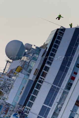 The passenger cruise ship Costa Concordia hit rocks and ran aground at 945pm on the Island of Giglio