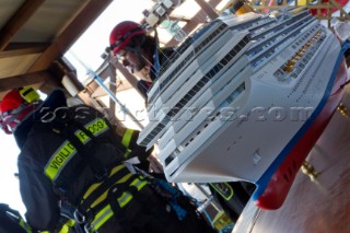 The passenger cruise ship Costa Concordia hit rocks and ran aground at 9.45pm on the Island of Giglio on January 13th 2012. The wrecked ship lays on a reef heeled on its side.