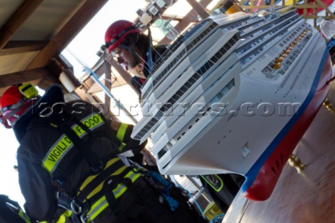 The passenger cruise ship Costa Concordia hit rocks and ran aground at 945pm on the Island of Giglio