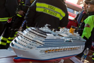 The passenger cruise ship Costa Concordia hit rocks and ran aground at 9.45pm on the Island of Giglio on January 13th 2012. The wrecked ship lays on a reef heeled on its side.