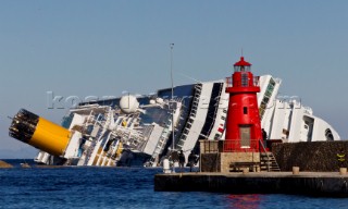 The passenger cruise ship Costa Concordia hit rocks and ran aground at 9.45pm on the Island of Giglio on January 13th 2012. The wrecked ship lays on a reef heeled on its side.