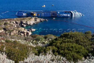 The passenger cruise ship Costa Concordia hit rocks and ran aground at 9.45pm on the Island of Giglio on January 13th 2012. The wrecked ship lays on a reef heeled on its side.