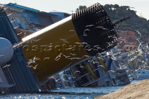 The passenger cruise ship Costa Concordia hit rocks and ran aground at 945pm on the Island of Giglio