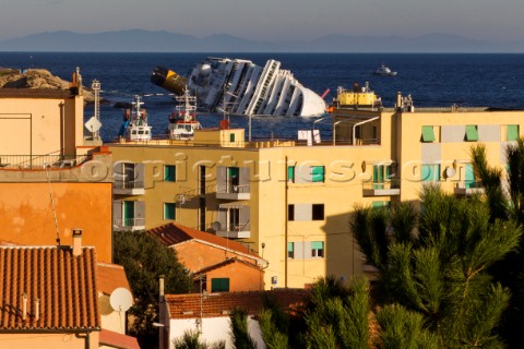 The passenger cruise ship Costa Concordia hit rocks and ran aground at 945pm on the Island of Giglio