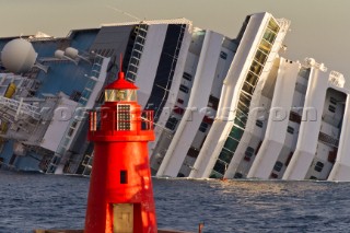 The passenger cruise ship Costa Concordia hit rocks and ran aground at 9.45pm on the Island of Giglio on January 13th 2012. The wrecked ship lays on a reef heeled on its side.