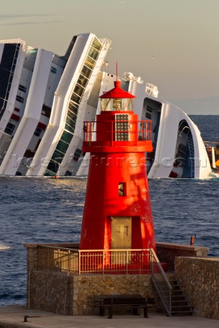 The passenger cruise ship Costa Concordia hit rocks and ran aground at 945pm on the Island of Giglio