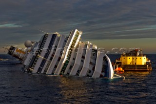 The passenger cruise ship Costa Concordia hit rocks and ran aground at 9.45pm on the Island of Giglio on January 13th 2012. The wrecked ship lays on a reef heeled on its side.