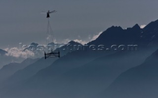 Russian helicopter lifts and transfers the multihull catamaran Alinghi 5 from Lake Geneva to Genoa on the Mediterranean