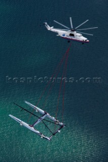 Russian helicopter lifts and transfers the multihull catamaran Alinghi 5 from Lake Geneva to Genoa on the Mediterranean