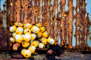 Iceland-Islanda, 22 11 2007  Garour. Fishermans marker dan bouys imported by container litter the shoreline