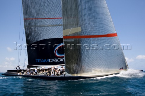 Team Origins GBR75 makes its maiden voyage from Port Americas Cup in Valencia in company with the ya