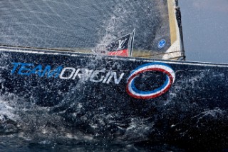 Team Origins GBR-75 makes its maiden voyage from Port Americas Cup in Valencia in company with the yacht America.