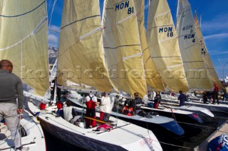 Montecarlo, 12-02-2011  Hoisting mainsails to sail away from the dock